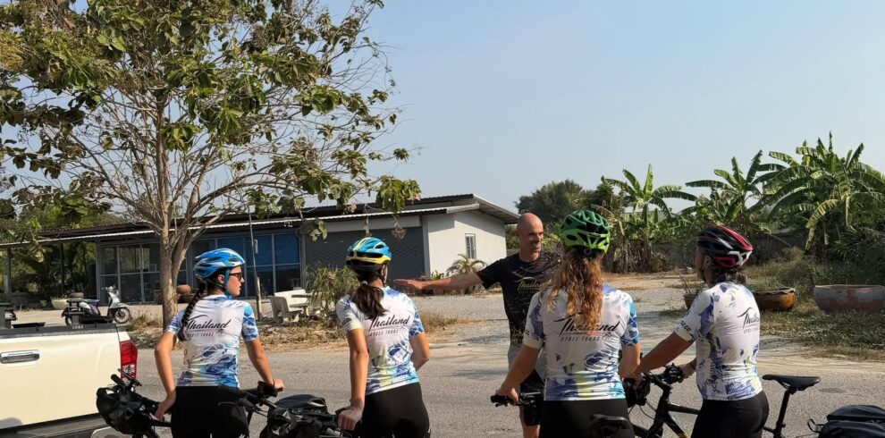 Self-guided cycling tour in Hua Hin, Thailand, with cyclists riding along scenic coastal roads, quiet countryside lanes, and tropical landscapes. Discover hidden beaches, local villages, and national parks at your own pace with GPS navigation from Thailand Cycle Tours.