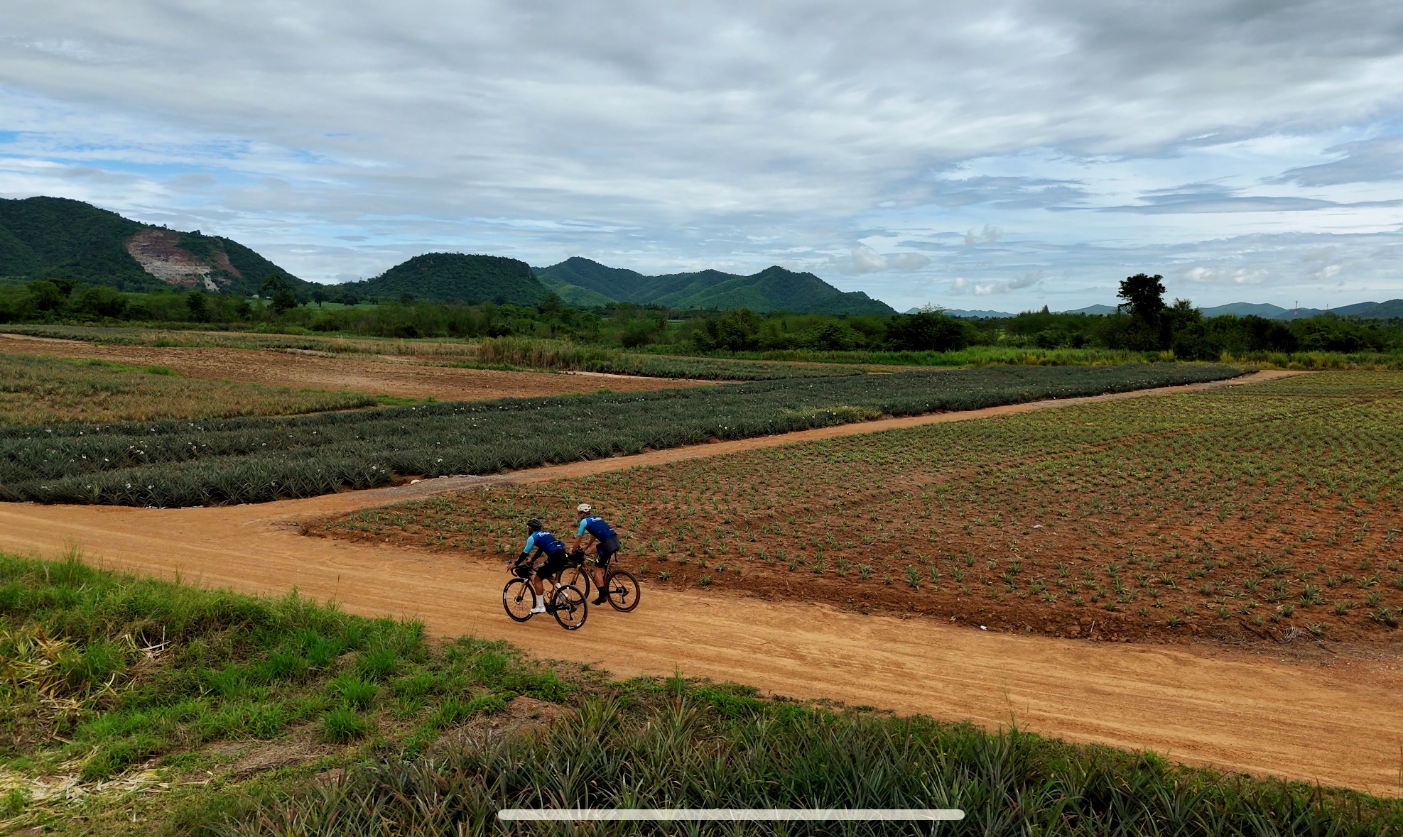 Gravel cycling tours with Thailand Cycle Tours in Hua Hin, Thailand, featuring riders exploring scenic backroads, dirt tracks, coastal trails, pineapple plantations, and remote countryside landscapes on guided and self-guided gravel bike adventures.