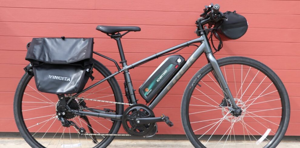 E-touring bike for self-guided tours with Thailand Cycle Tours, equipped with a rear bike rack, pannier bags, and electric pedal assistance, ideal for exploring Thailand’s scenic countryside, coastal routes, and multi-day cycling adventures in comfort.