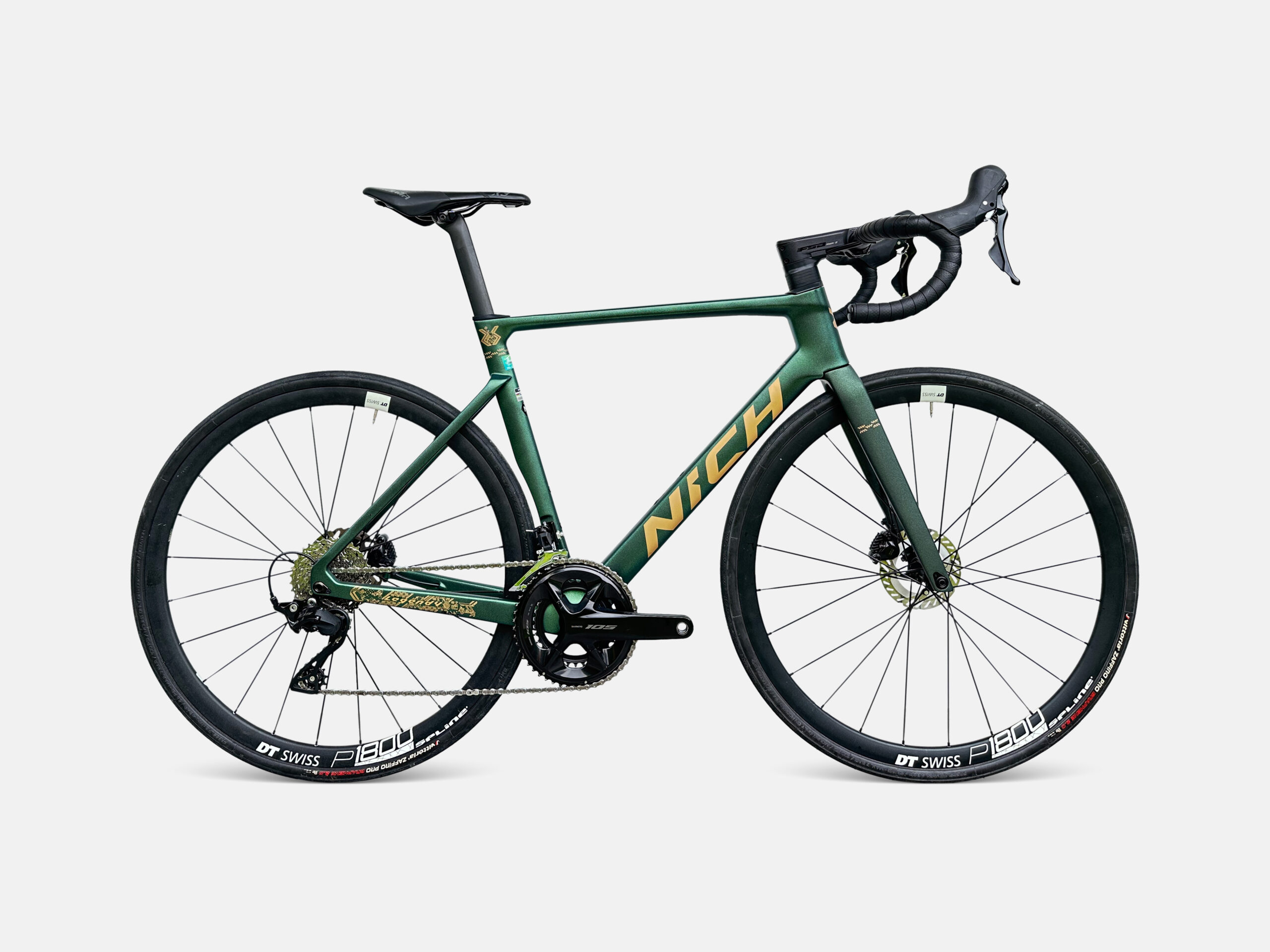Studio photo of the lightweight Nich Carbon Legend 4 road bike featuring hydraulic disc brakes, available for tour rentals.