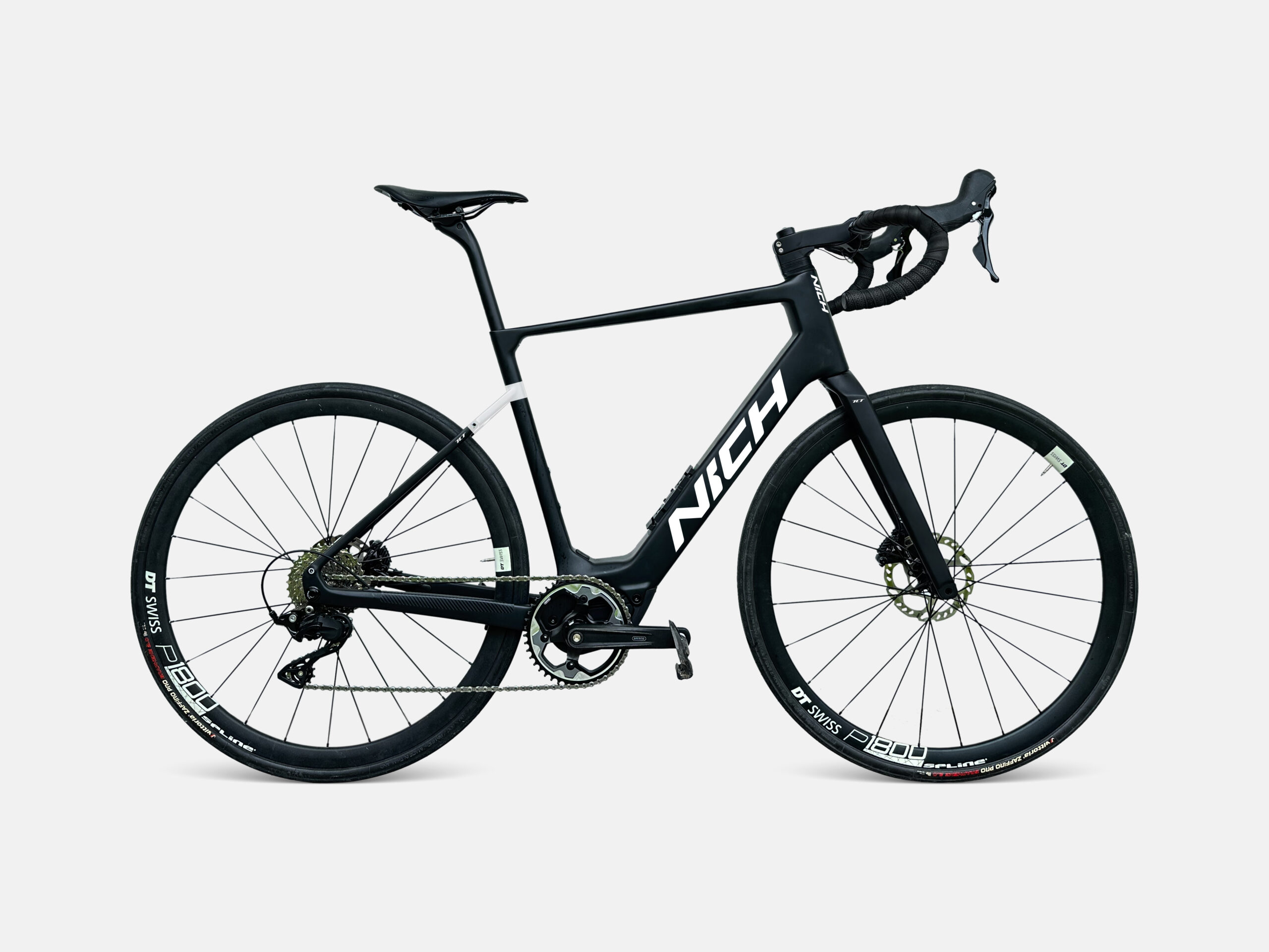 Studio portrait of a high-performance Nich carbon electric road bike.