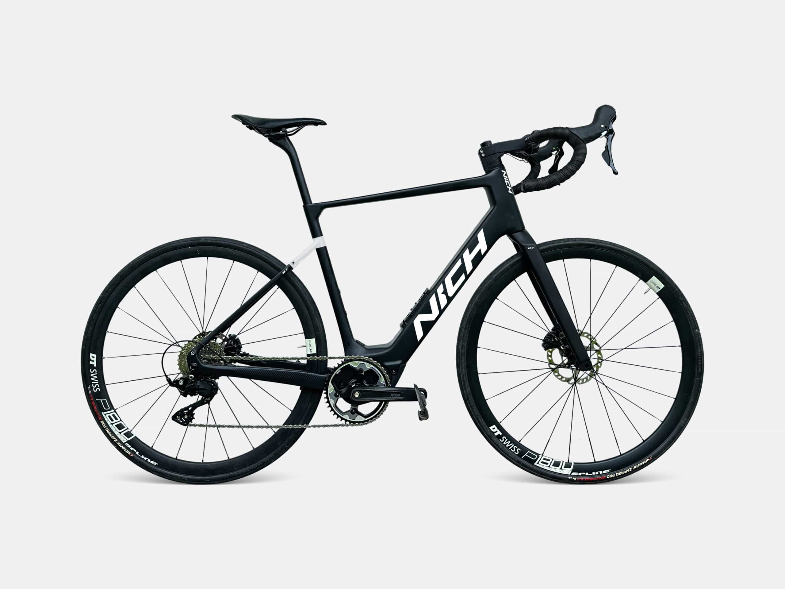 Studio portrait of a high-performance Nich carbon electric road bike.