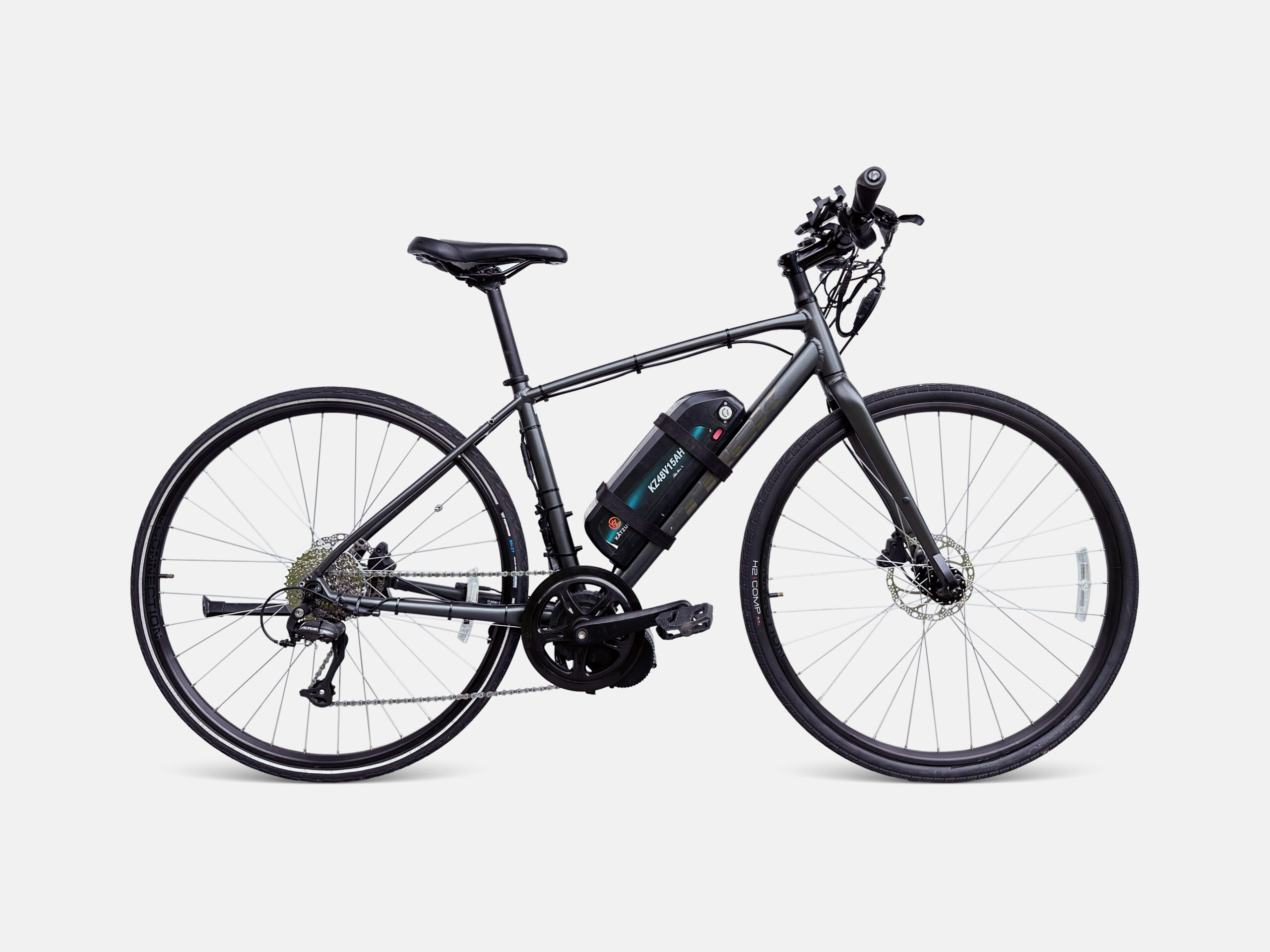 Studio photo of a Trek FX2 hybrid electric bike equipped with a Bafang mid-drive motor.