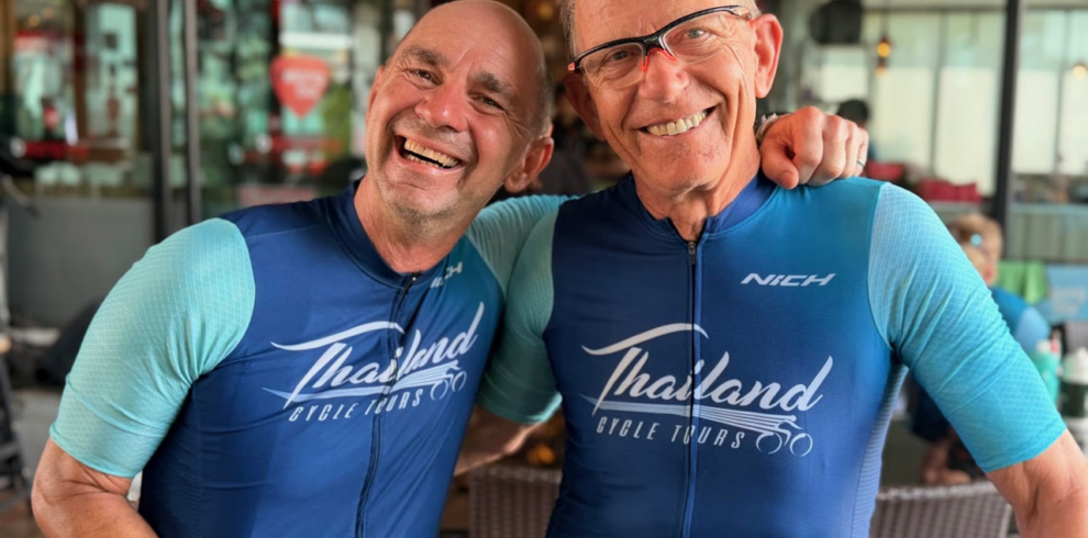 Happy cyclists smiling during a Thailand Cycle Tours adventure, enjoying scenic rides through Thailand’s beautiful landscapes, tropical countryside, coastal roads, and cultural highlights on a memorable cycling holiday.