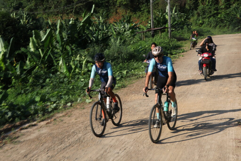 Cycling local road laos with thailand cycle tours