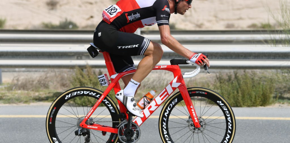 Professional triathlete Will Clarke racing on his road bike, coach for the 2027 Thailand Cycle Tours Triathlon Camp.